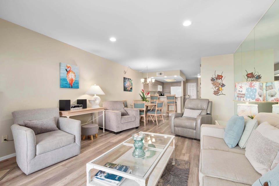 Living Room to Dining Area and Full Kitchen 