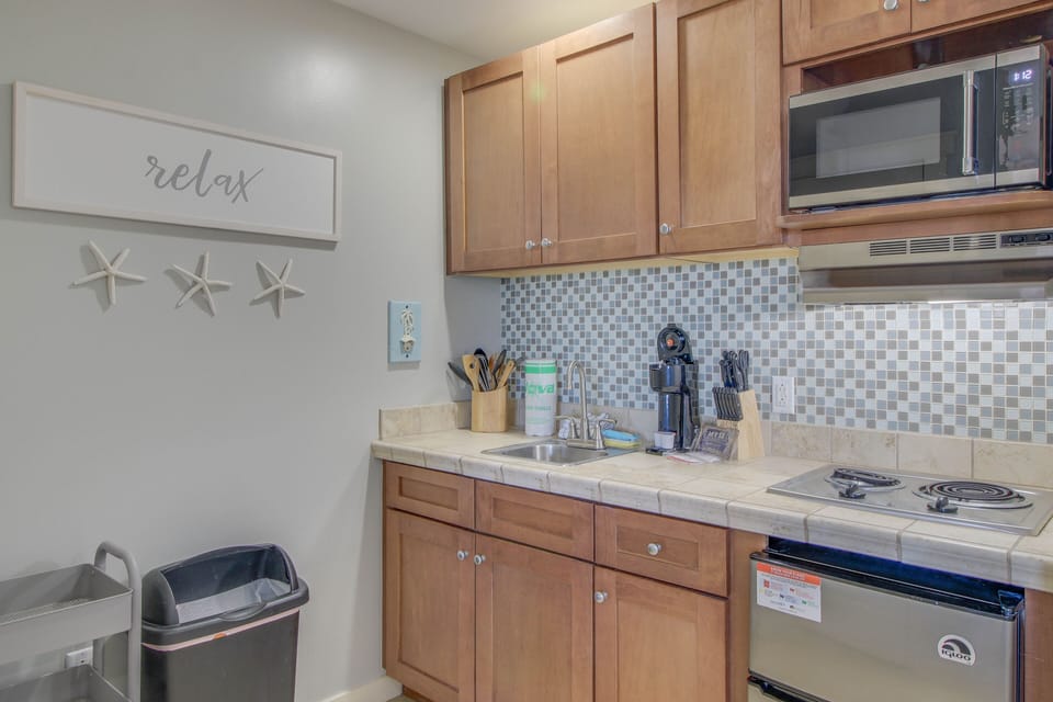 Kitchenette with dorm size fridge & everything you will need to make some quick meals!