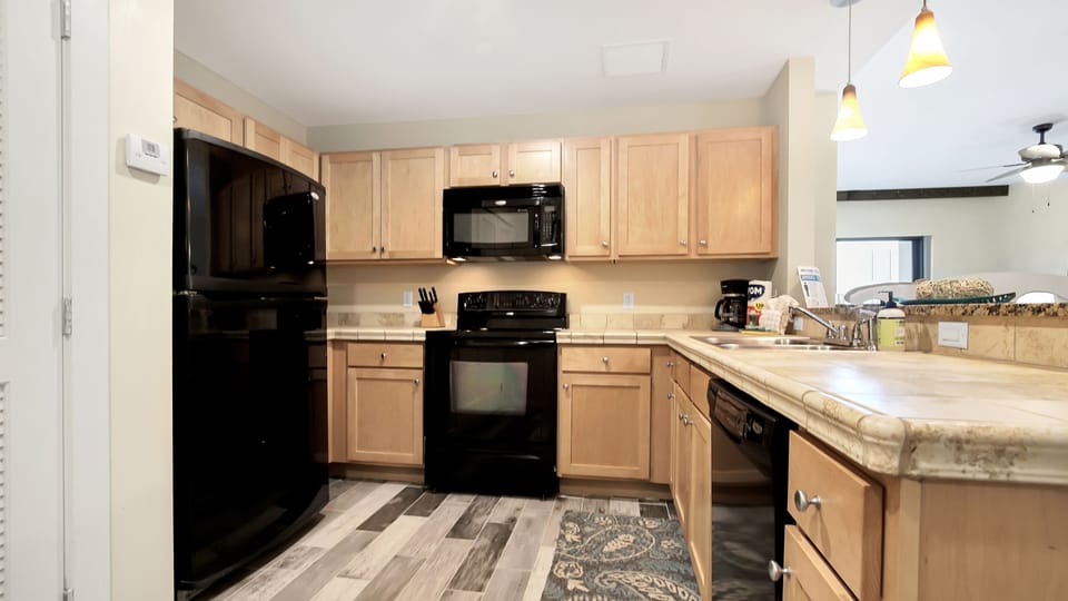 Full kitchen with stove and dishwasher!