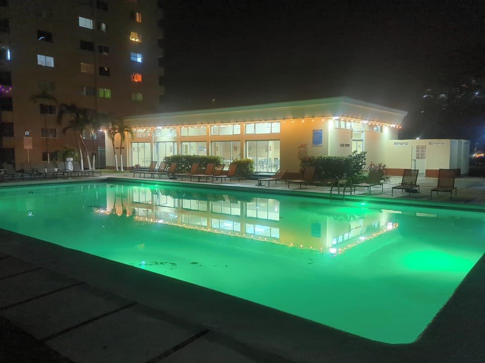 Lit up Swimming pool & club house
