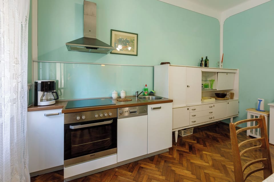 Villa | Private kitchen | Fridge, microwave, oven, stovetop