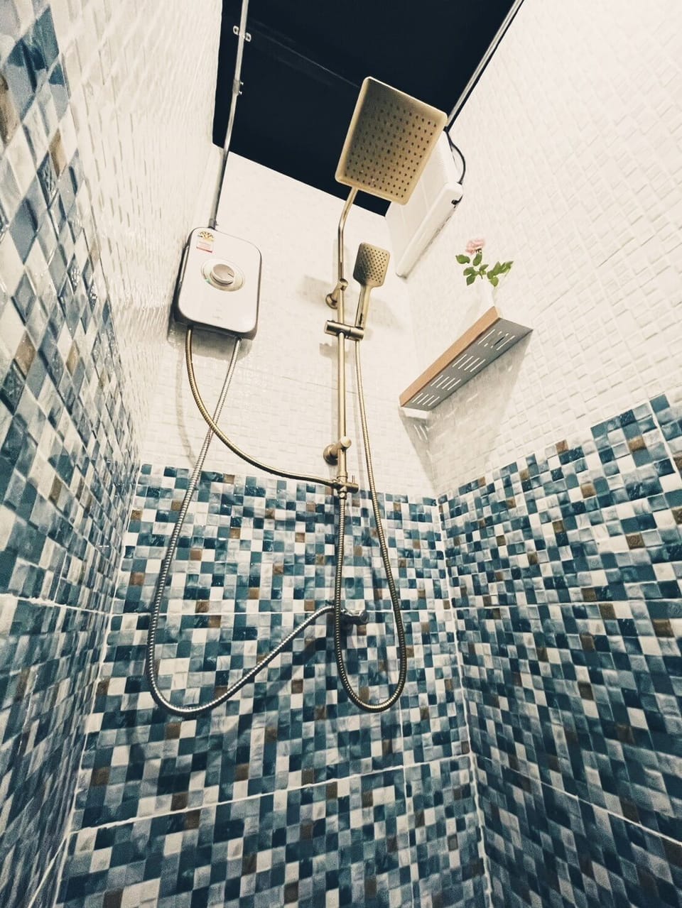 Shower, free toiletries, slippers, towels