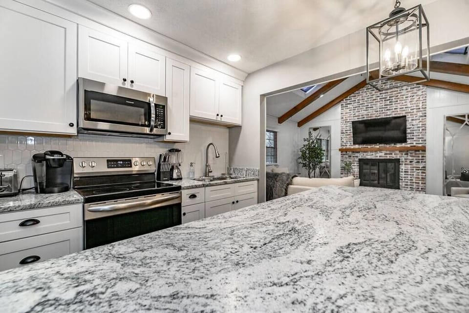Cook, connect, and create memories in this bright, modern kitchen, fully equipped for everything from morning coffee to family feasts.