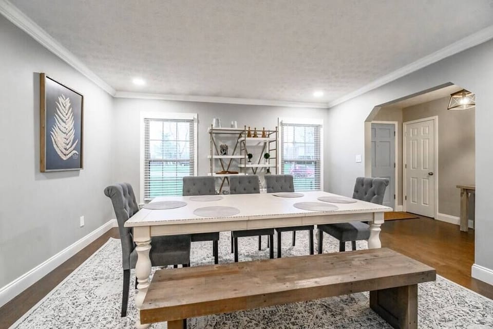 Spread out the
board games
after the
plates are
cleared — this
table pulls
double duty
for meals and
game night,
both for your
group.