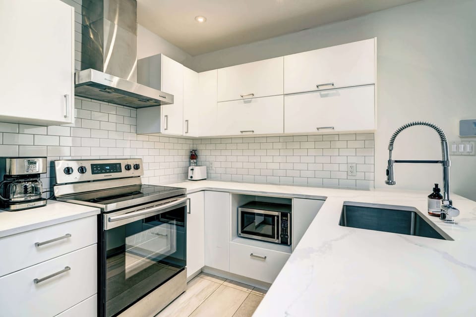 Spacious kitchen with ample counter space and a convenient layout.