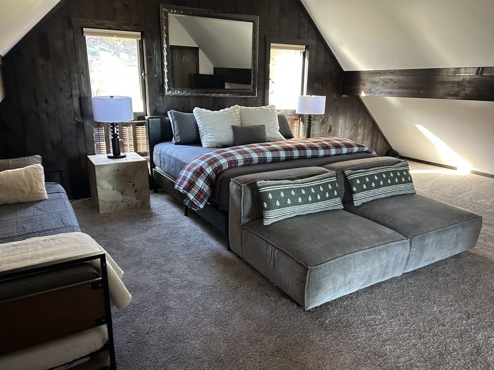 Bedroom 1- Enjoy sitting on the comfortable sofa watching the incredible views.