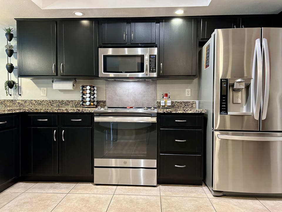 All new stainless appliances and well stocked kitchen