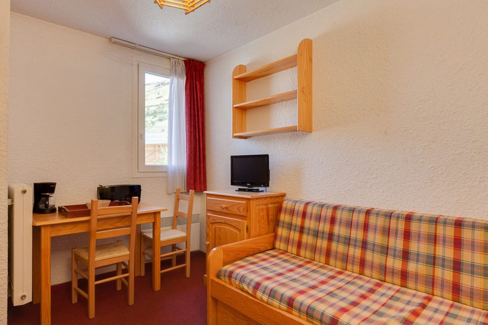 Kick back your feet and relax in the cozy living area.