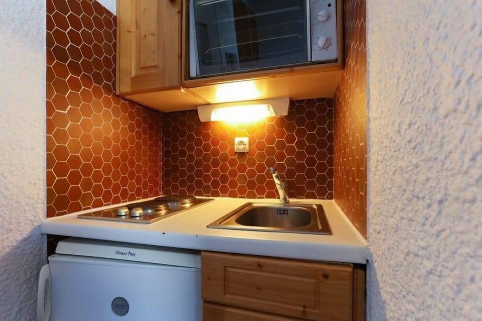 Make a quick meal in your kitchenette.