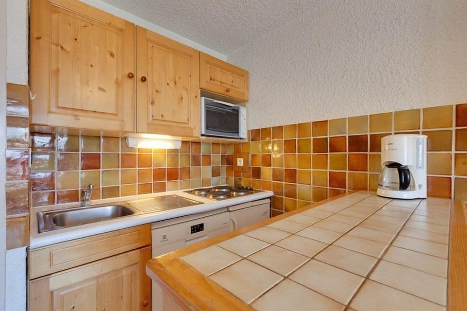 Prepare a meal in the equipped kitchenette.