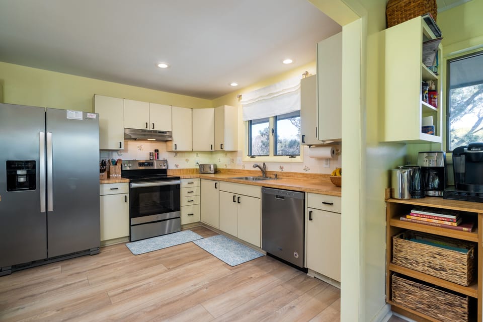 Large kitchen with stainless steel appliances