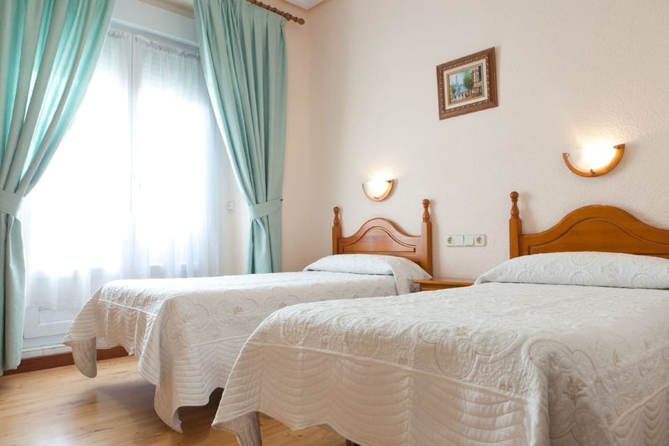 Twin Room | Memory foam beds, desk, free WiFi, bed sheets