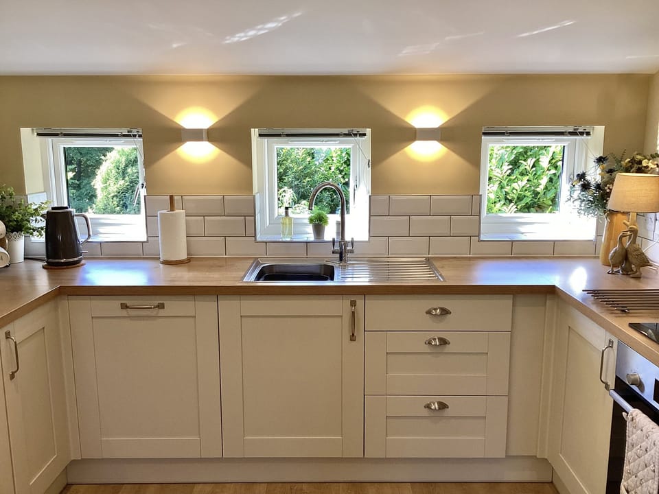 Fridge, microwave, cookware/dishes/utensils