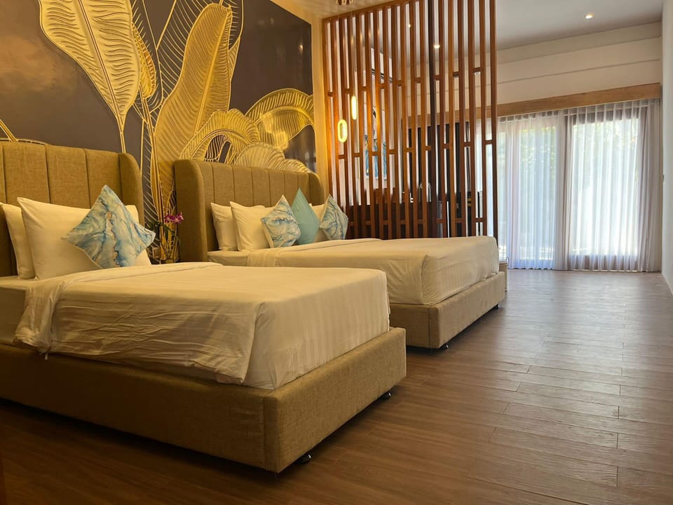 Triple Suite, 1 Bedroom | Premium bedding, minibar, in-room safe, blackout drapes