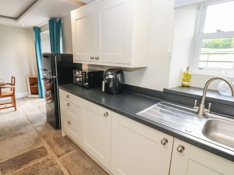 Fridge, microwave, electric kettle, toaster