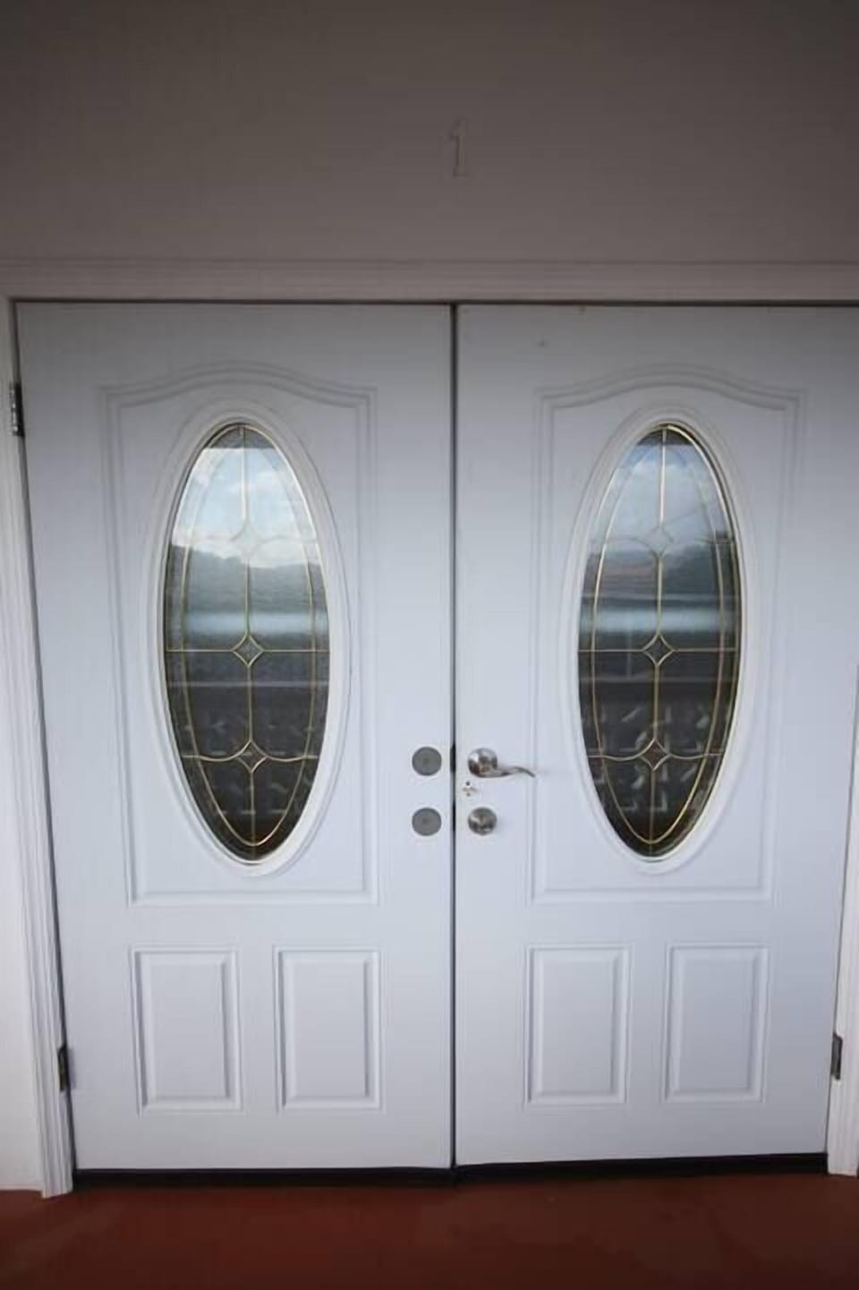 Double entry doors - full screens and can open wide up for that breeze - Facing west.