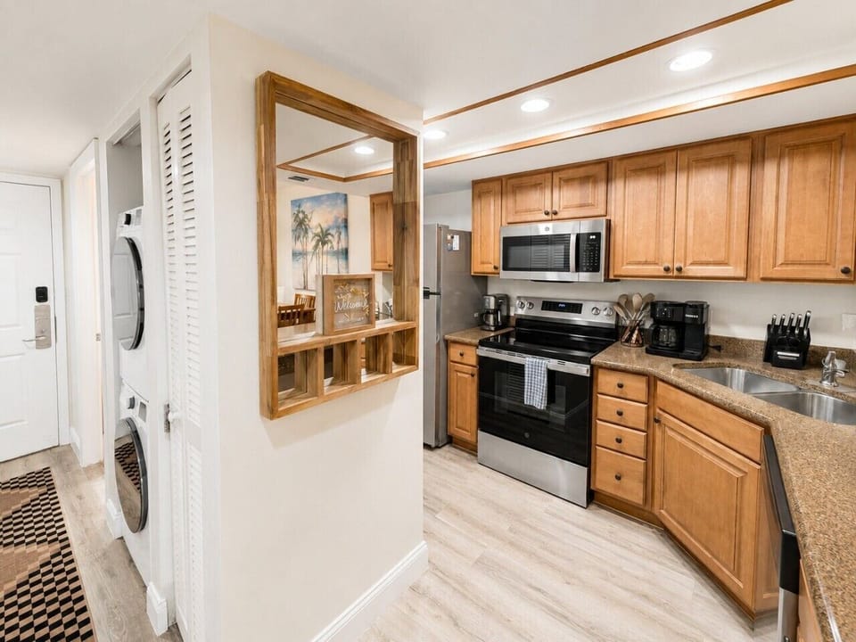Kitchen convenience with laundry just steps away