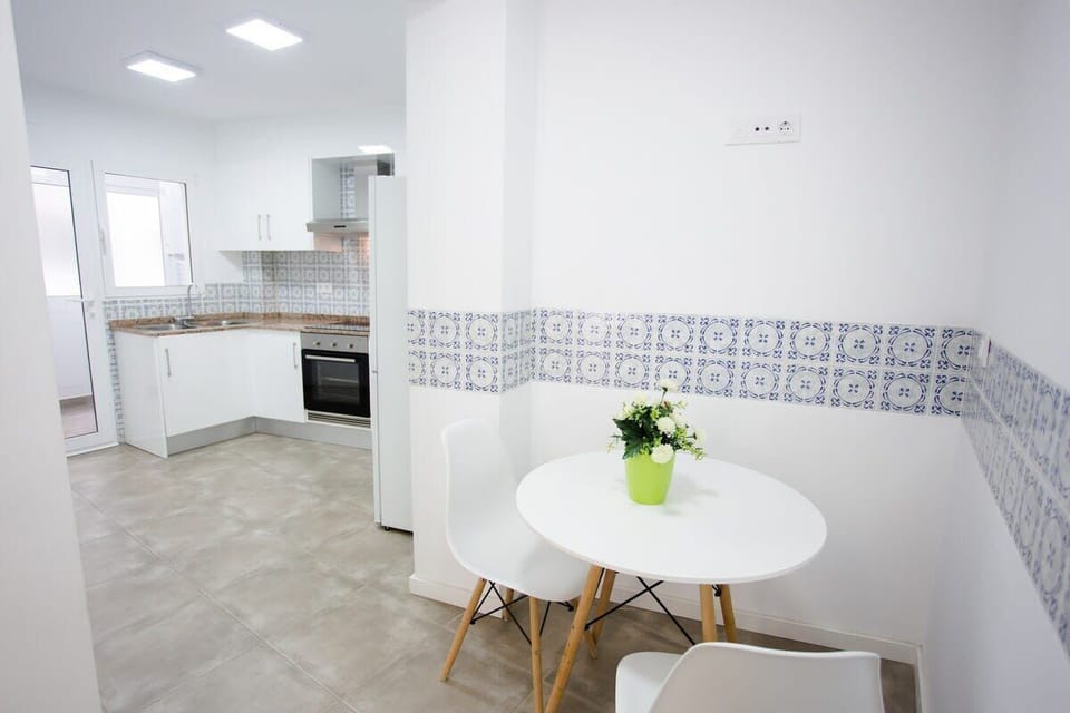 Small dining nook in the kitchen- perfect for a quick breakfast.