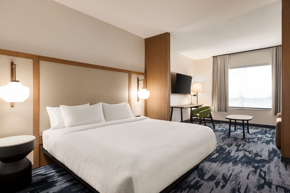 Premium bedding, memory foam beds, desk, laptop workspace