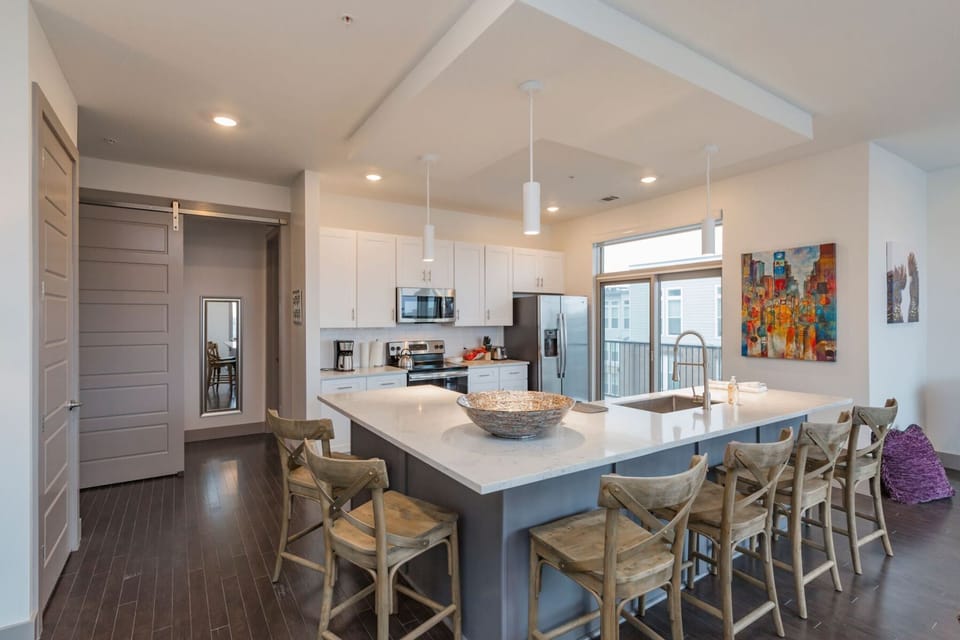The kitchen area provides plenty of counter space for cooking or eating a meal!