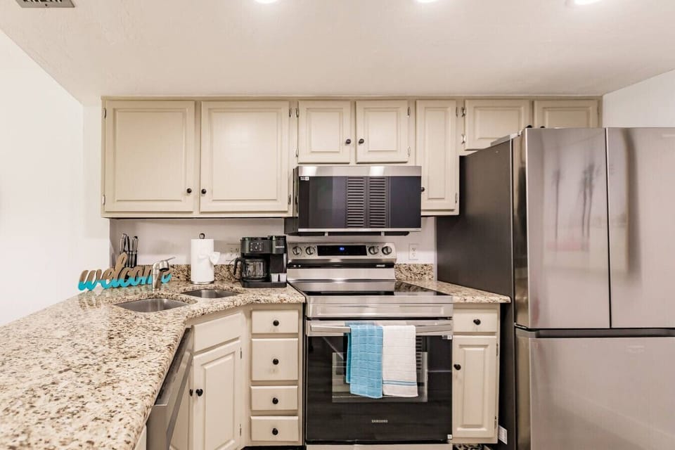 Beautiful granite countertops with updated appliances.