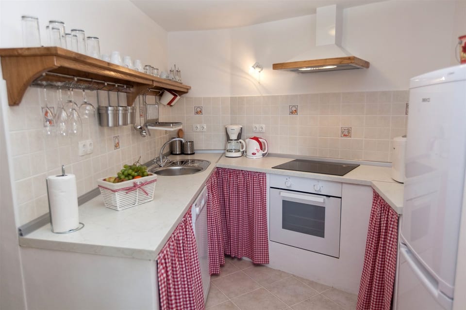 Villa | Private kitchen | Fridge, oven, stovetop, dishwasher