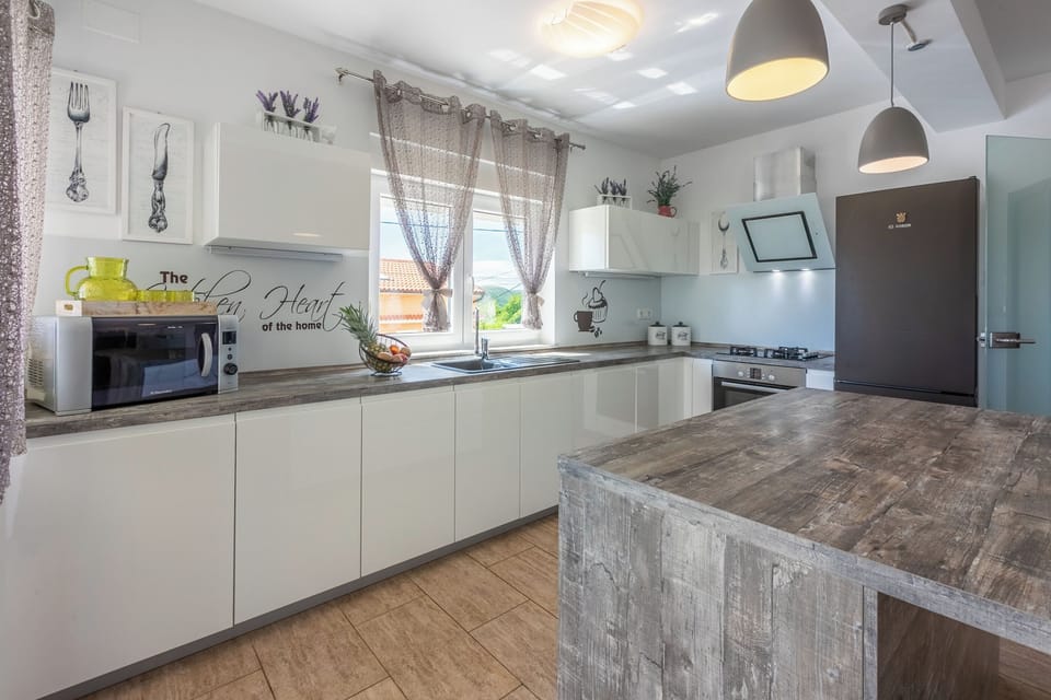 Villa | Private kitchen | Espresso maker, fridge, microwave, oven