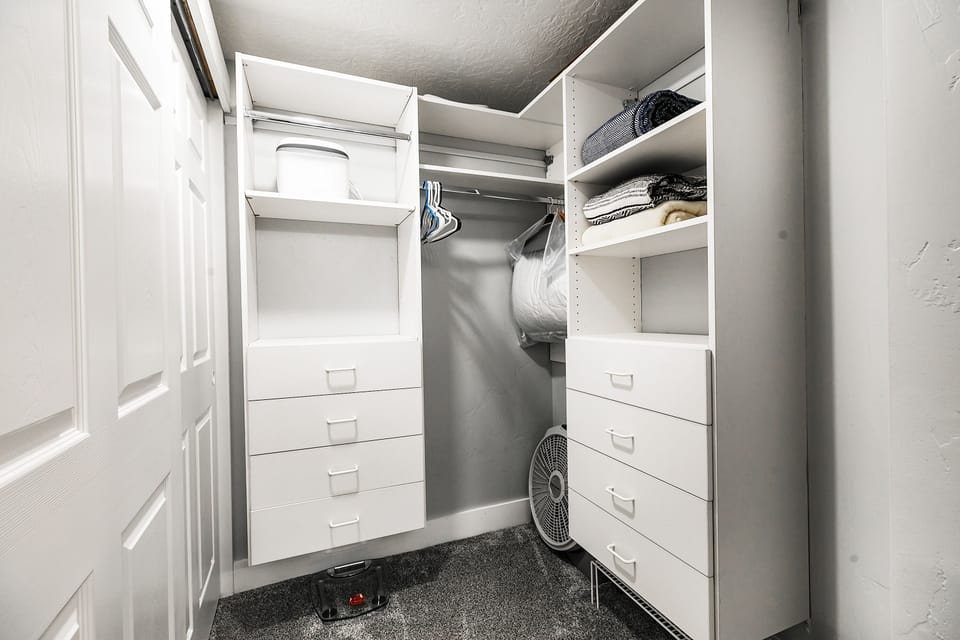 Walk in closet in the main bedroom