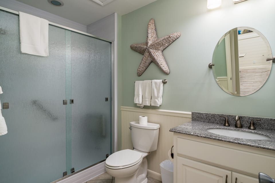 Single vanity in en suite bath
