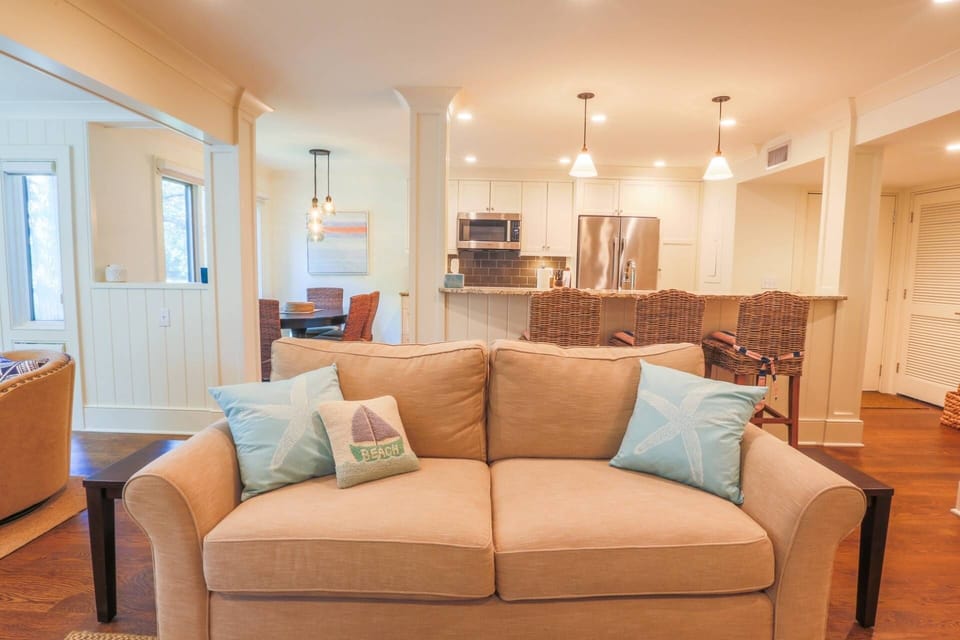 We love the shiplap walls and white crown molding in this warm, comfortable room.