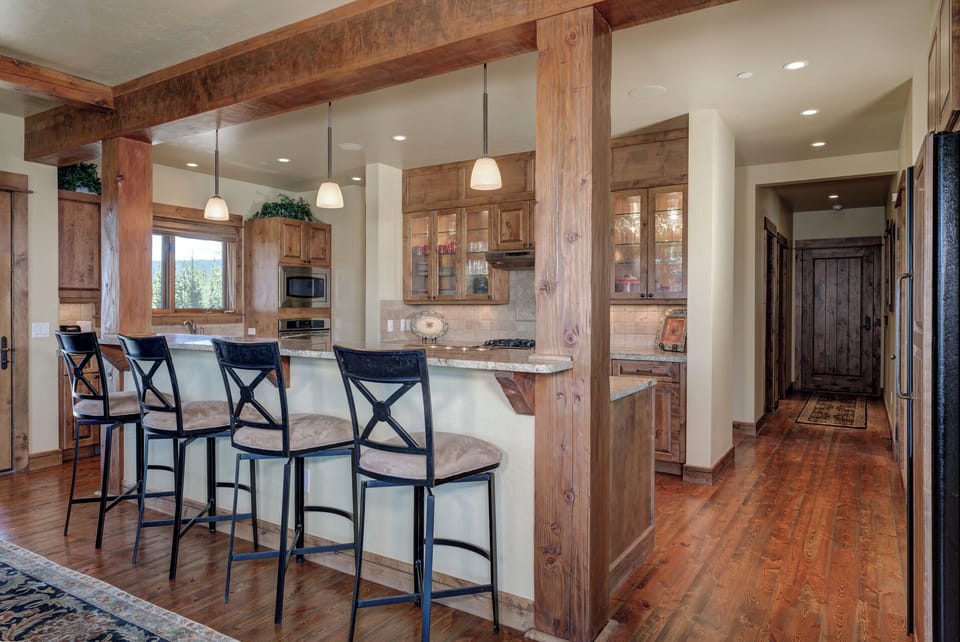 Four seats at the kitchen island.