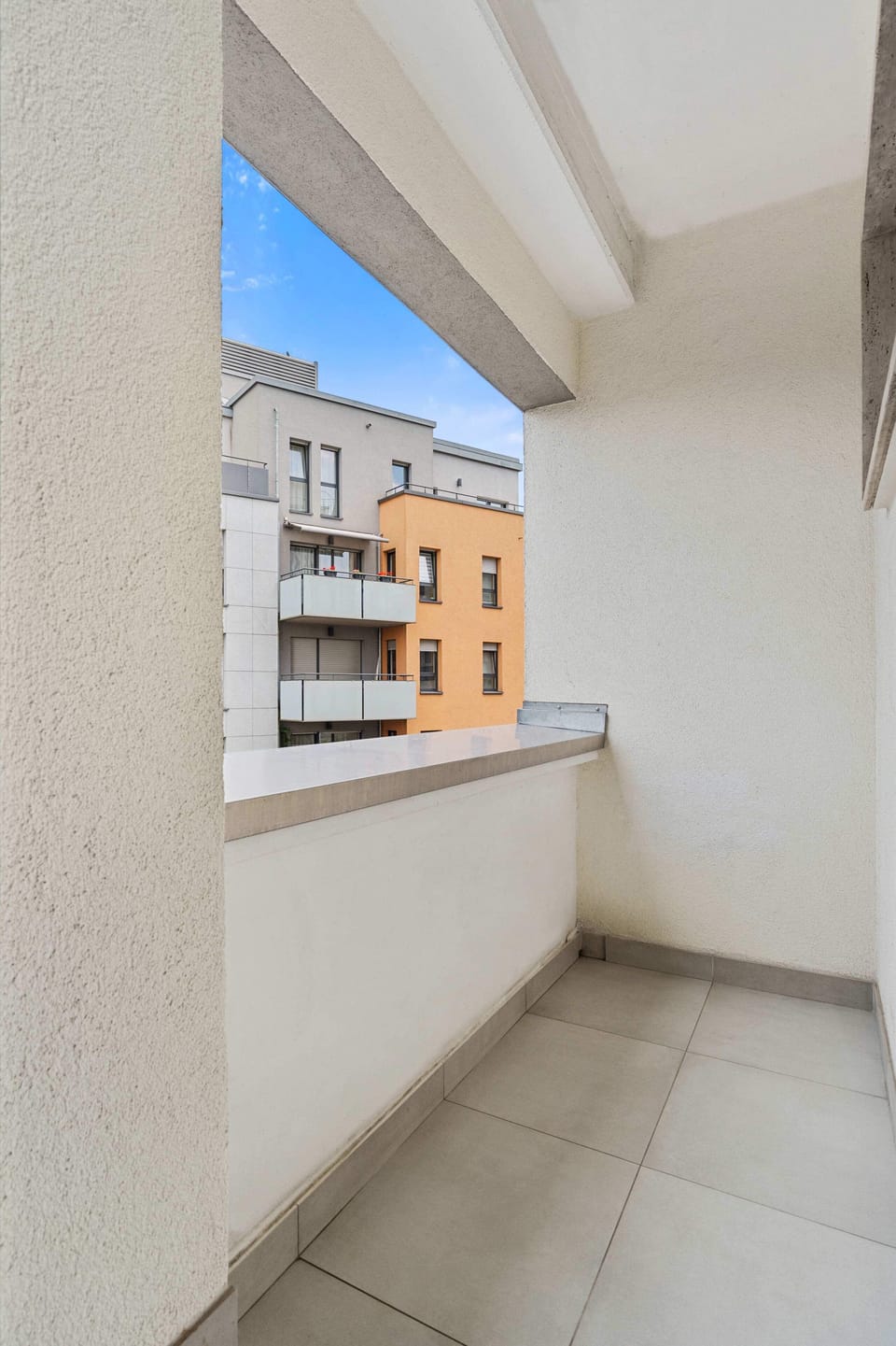 Breathe in the fresh air and city vibes from your private balcony oasis.