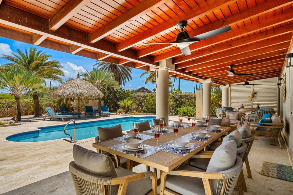 Outdoor dining table for enjoying meals by the pool