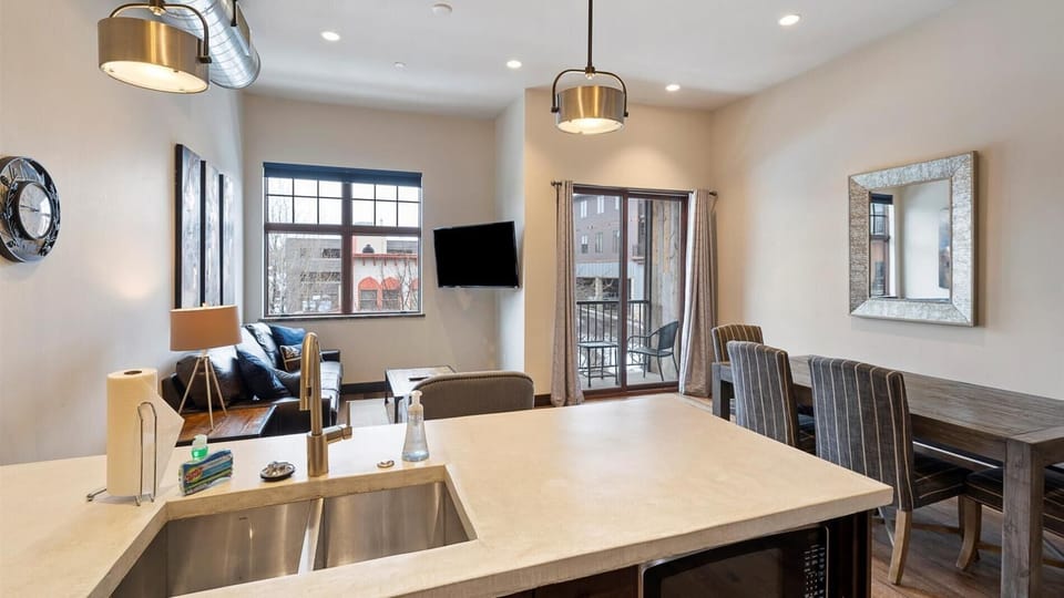Open concept living room, dining room, and kitchen