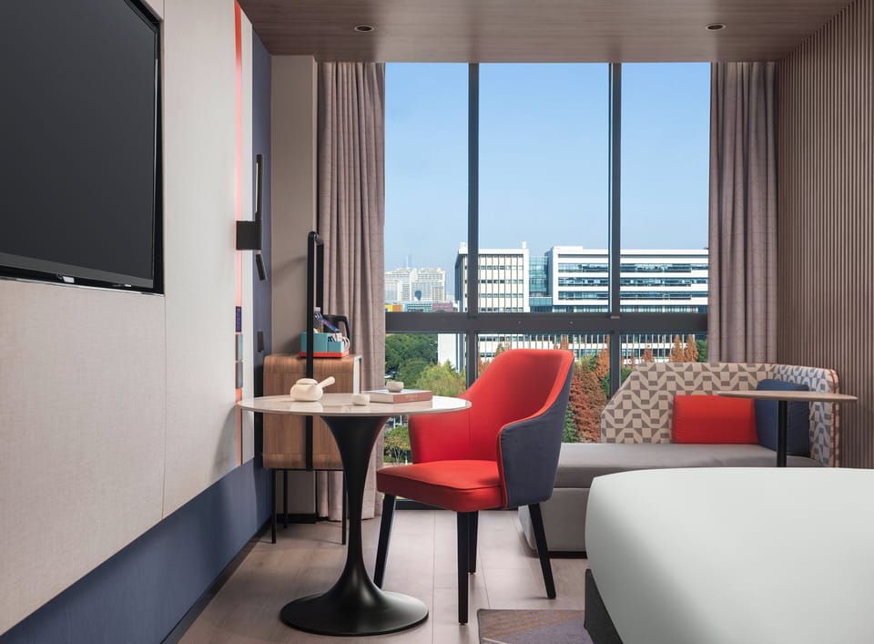 1 King Standard High Floor | Down comforters, desk, laptop workspace, blackout drapes