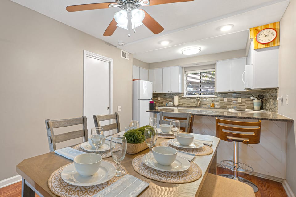 The open dining and living area creates a comfortable gathering space for meals, conversation, and relaxation.