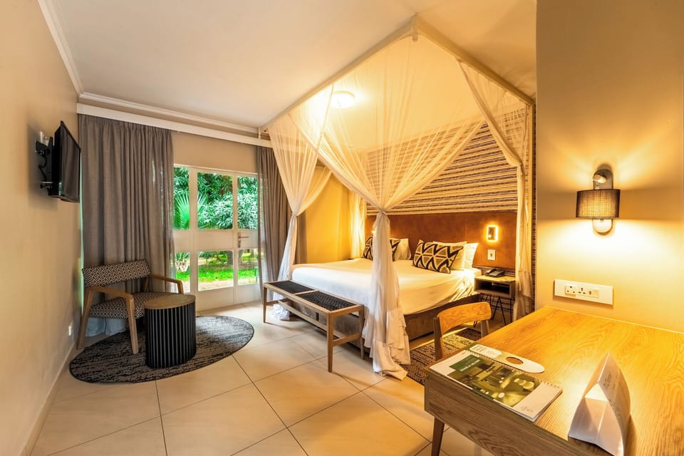 Standard Room, 1 Double Bed, Garden View | In-room safe, desk, laptop workspace, blackout drapes