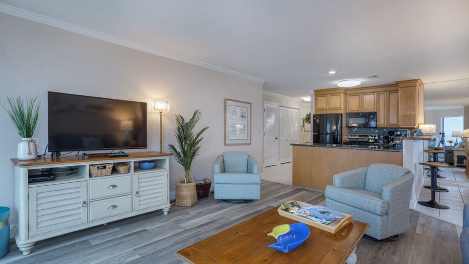 The open layout makes this the perfect gathering space for unwinding after a day on the sand.