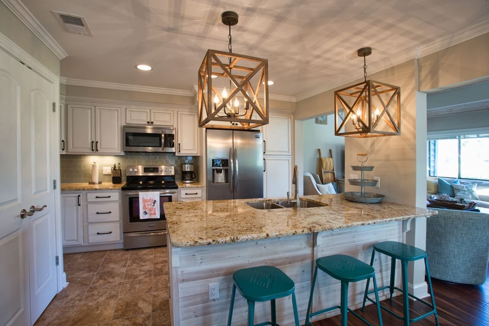 The oversized island offers seating for casual meals or morning coffee.