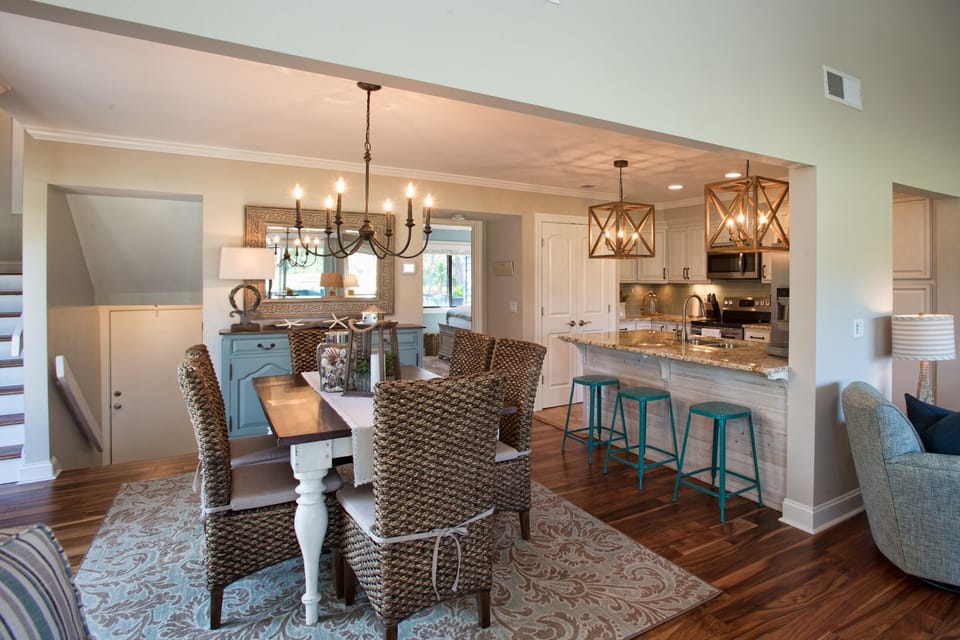 Positioned just off the kitchen, it's a convenient and comfortable spot for shared meals, game nights, and vacation memories.