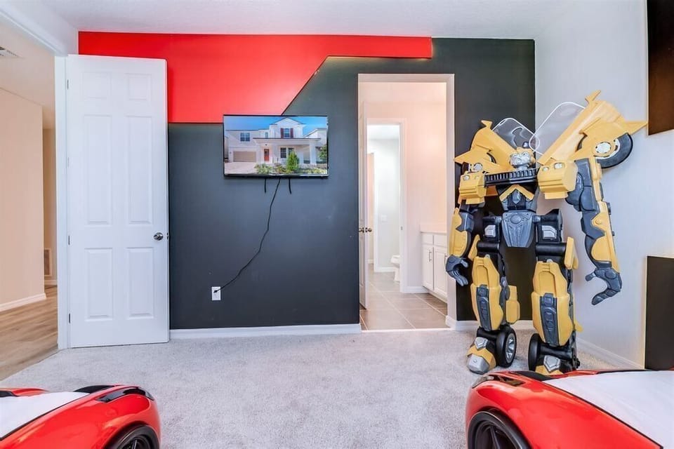 Unbelievable Transformers-themed bedroom with flat screen TV
