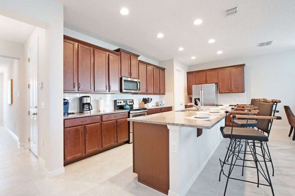 View 3 of gorgeous kitchen with barstool seating