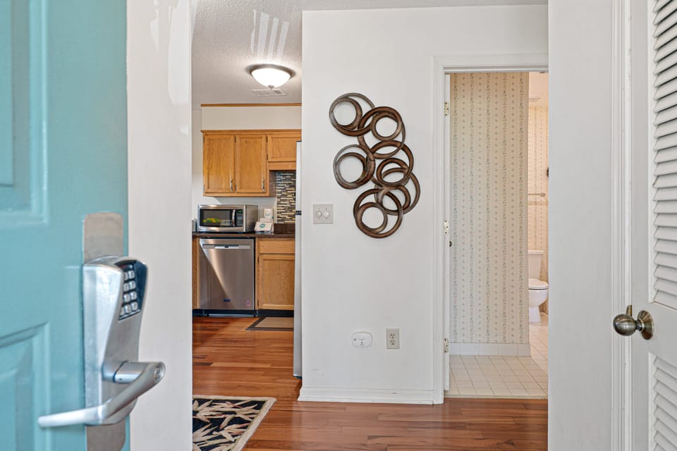 The welcoming entry foyer sets the tone for a relaxing coastal getaway.