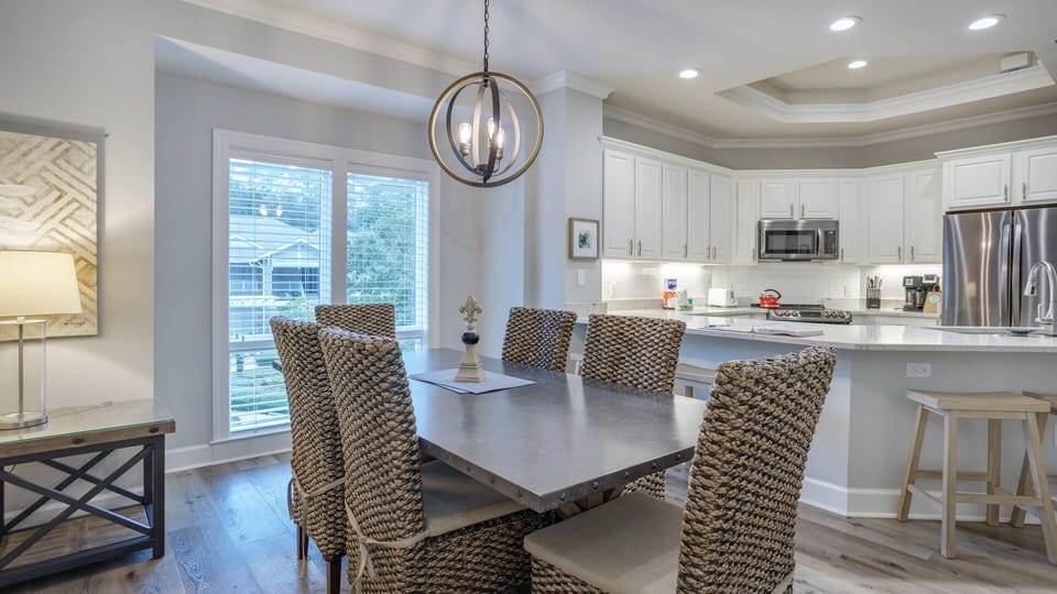 The dining area flows naturally into the kitchen, making meals and conversation effortless.