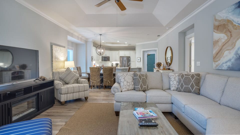 Comfortable seating centers the space, with a large TV for movie nights or winding down after a day out.