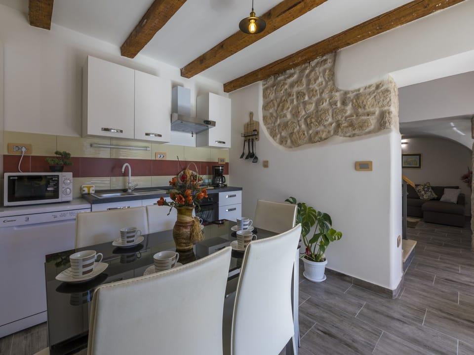 Villa | Private kitchen | Fridge, microwave, oven, stovetop