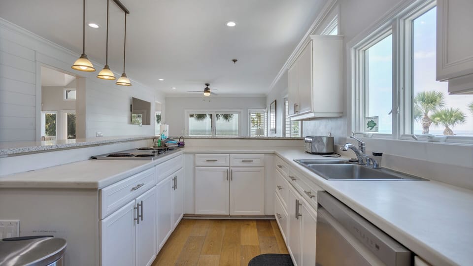Ample counter space makes meal preparation easy, while the open layout allows the cook to stay part of the conversation.