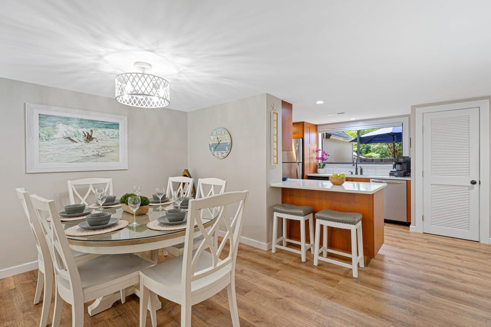 The open layout keeps everyone connected while maintaining a bright, airy feel throughout the main living spaces.