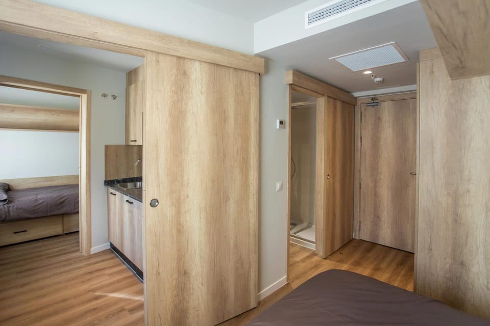 Apartment, 2 Bedrooms | Down comforters, desk, laptop workspace, blackout drapes