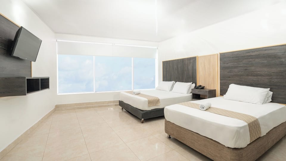 Quadruple Room | Premium bedding, in-room safe, bed sheets